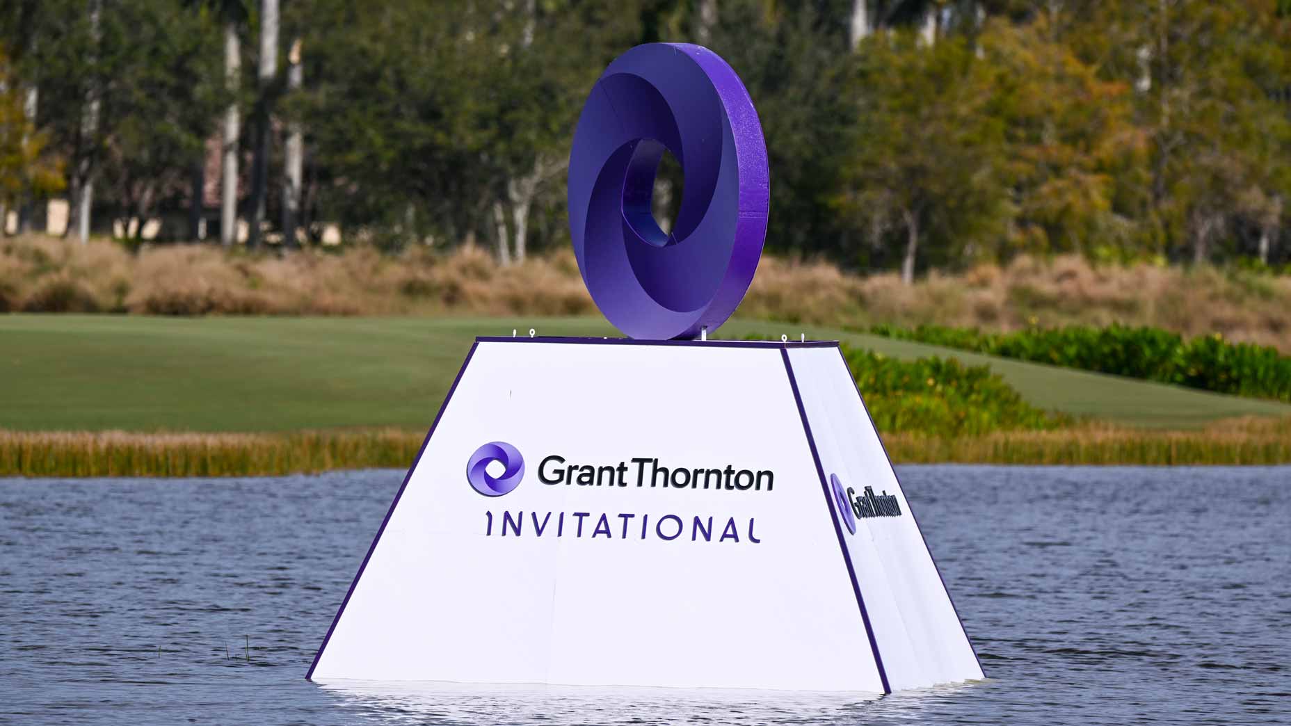 Grant Thornton Invitational sign in pond near the 18th green prior to Grant Thornton Invitational at Tibur?n Golf Club on December 7, 2023 in Naples, Florida, United States.